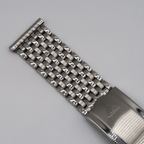 Beads-of-rice bracelet: Forstner, 9-row