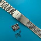 Beads-of-rice bracelet: Heuer, single grain, fliplock