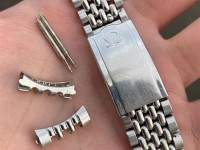 Omega bracelet with its end links removed (search photo)